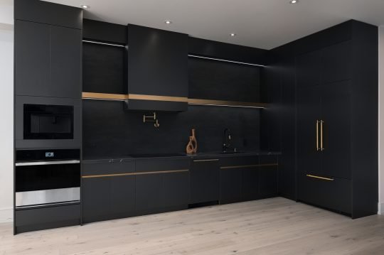 Luxury Toronto kitchen interior with custom lighting and marble island