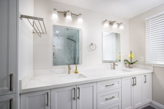Stylish interior of a minimalist modern bathroom with styled design, photographed in Toronto