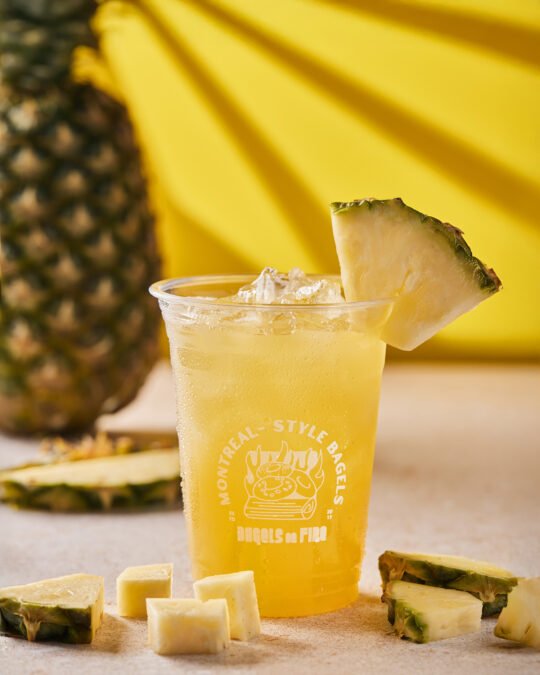 Healthy Pineapple juice shoot on the table with shadow on the back – Food and beverage photography