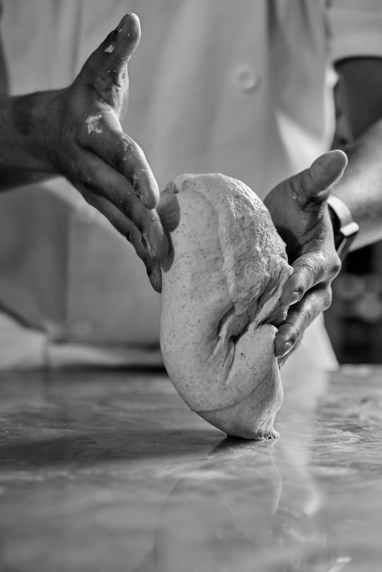 The process of making a bread styled for a commercial food photography shoot