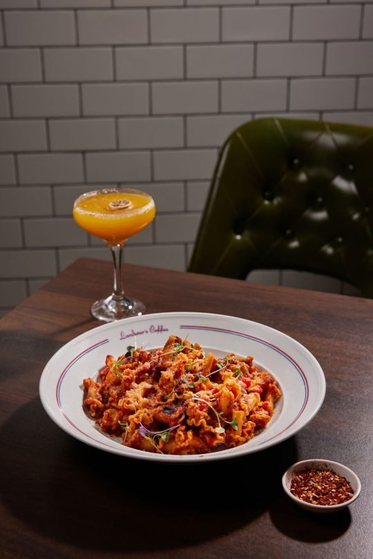 Seafood spaghetti with shrimp and mussels, plated for an upscale restaurant shoot in Toronto