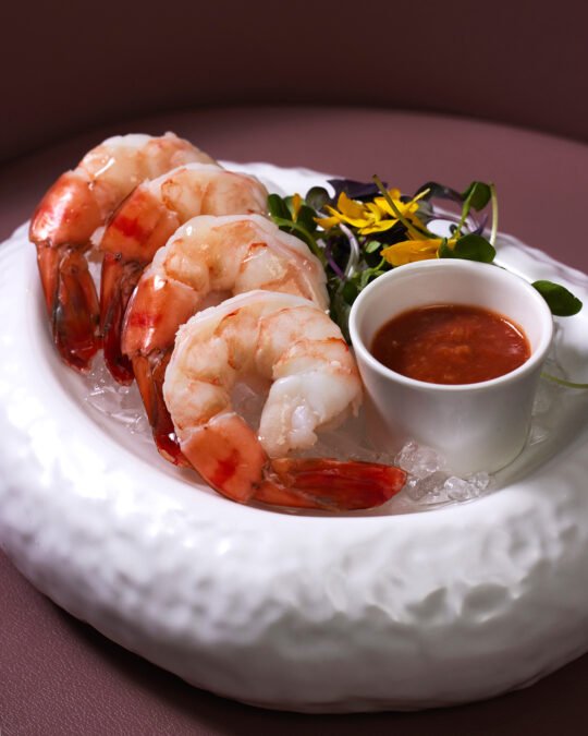 Close up of Shrimp salad on the pink background and moody tone