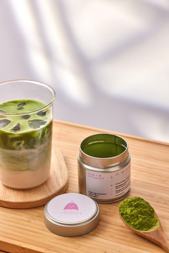 Photoshoot of Matcha drink lifestyle on the table near the window, shadow on the background to show its evening light